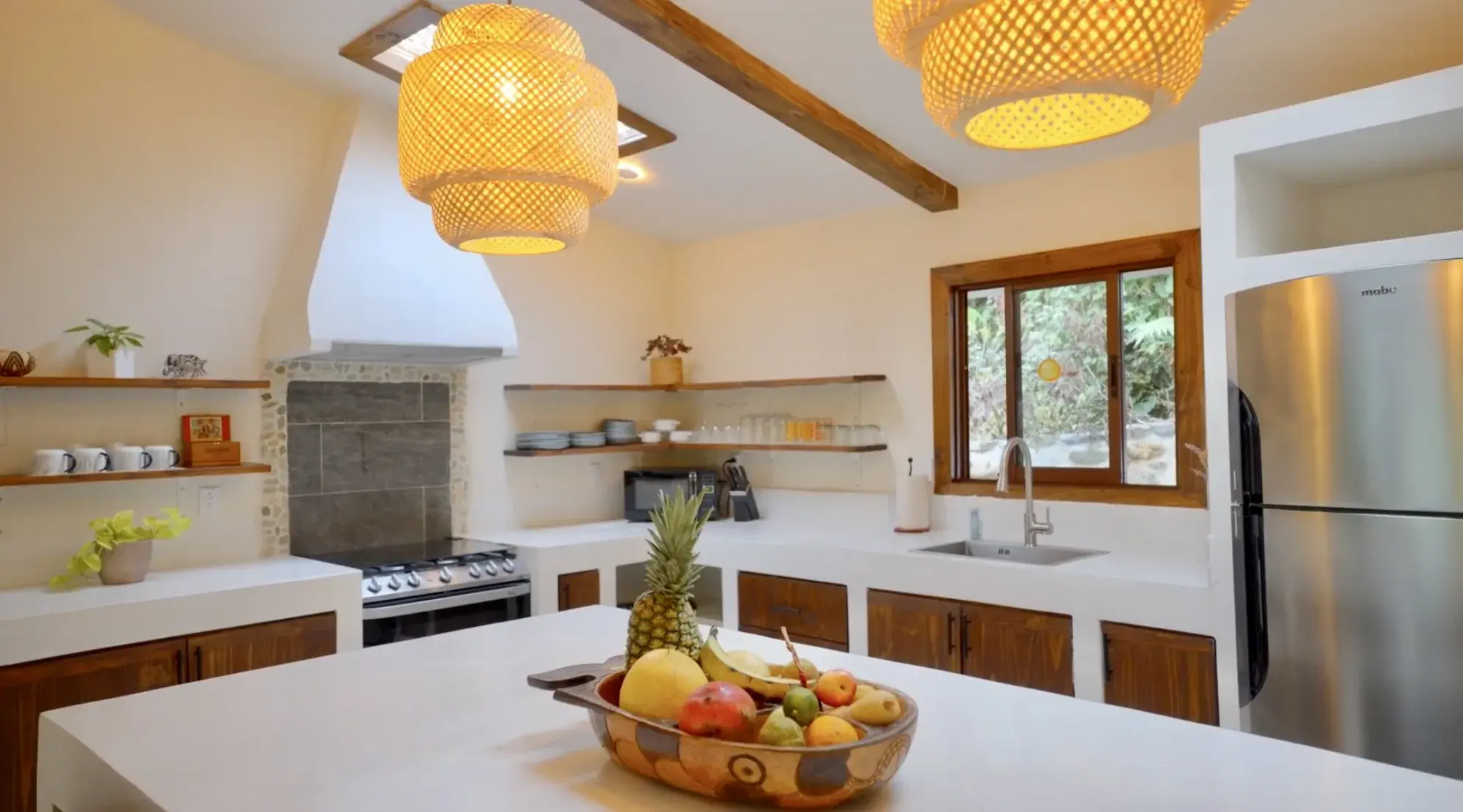 Modern kitchen with breakfast bar in the turnkey Costa Rica mountain home