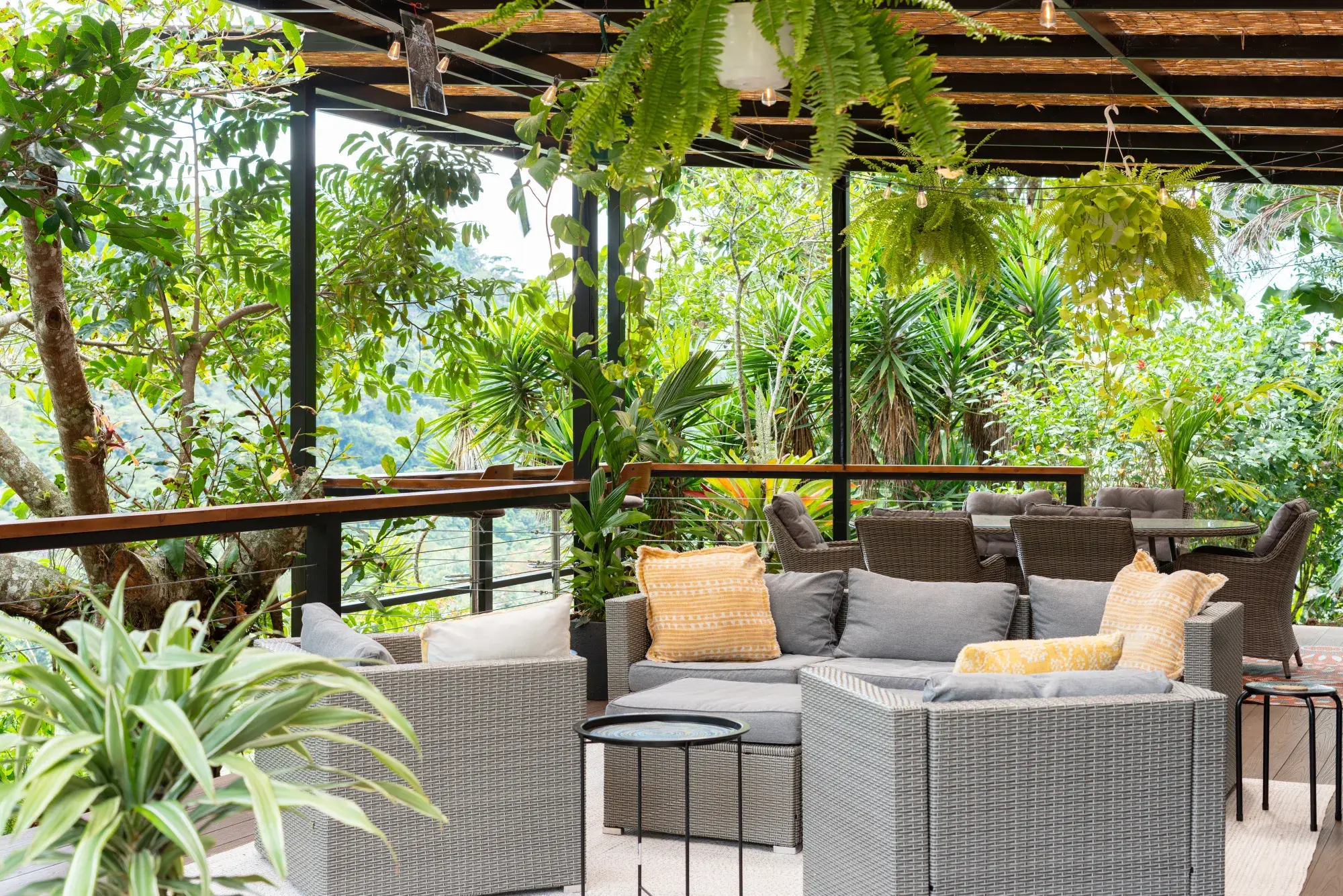 Deck and outdoor seating at the luxury mountain estate near Dominical