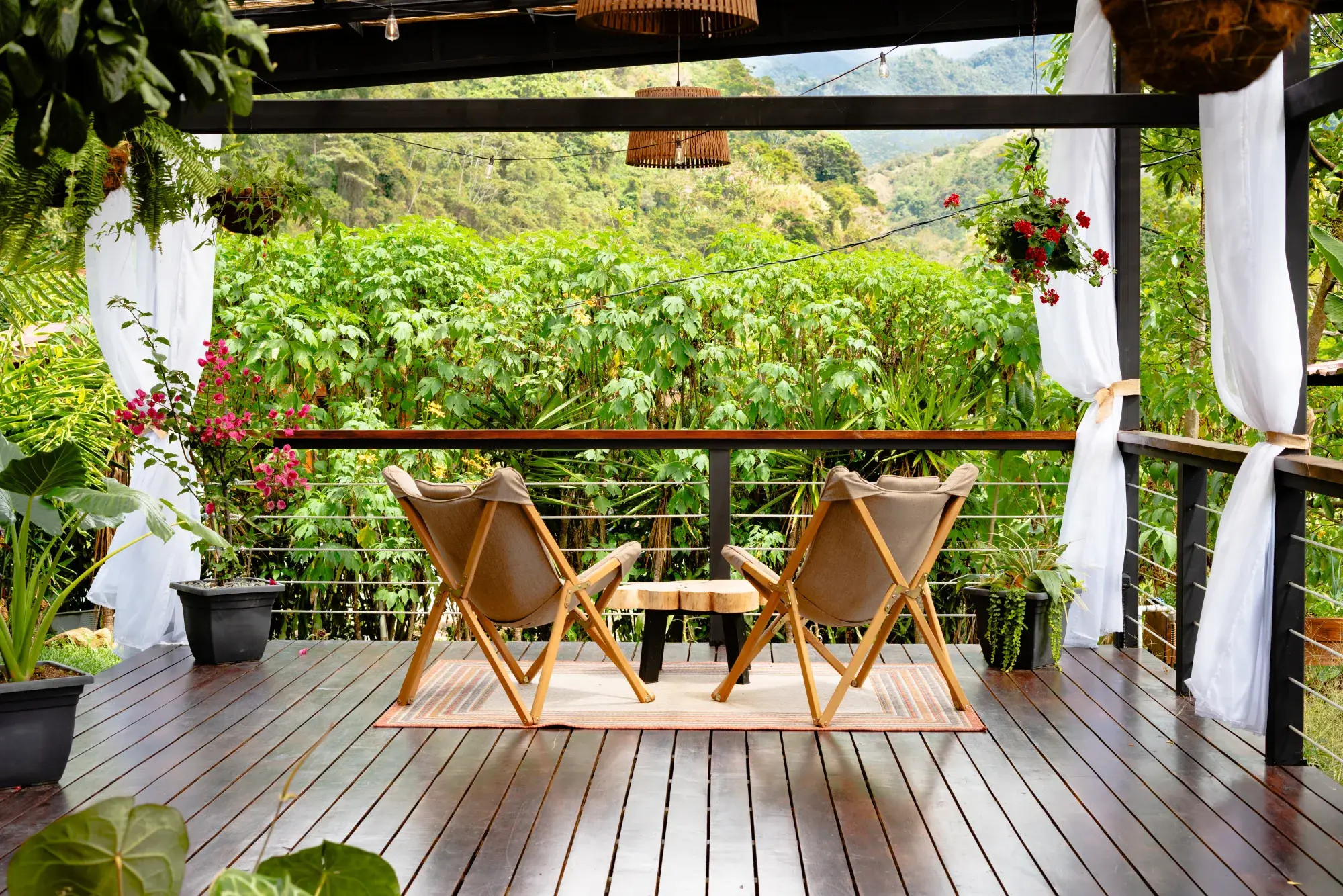 Yoga pavilion with sheer curtains overlooking the valley in Pérez Zeledón