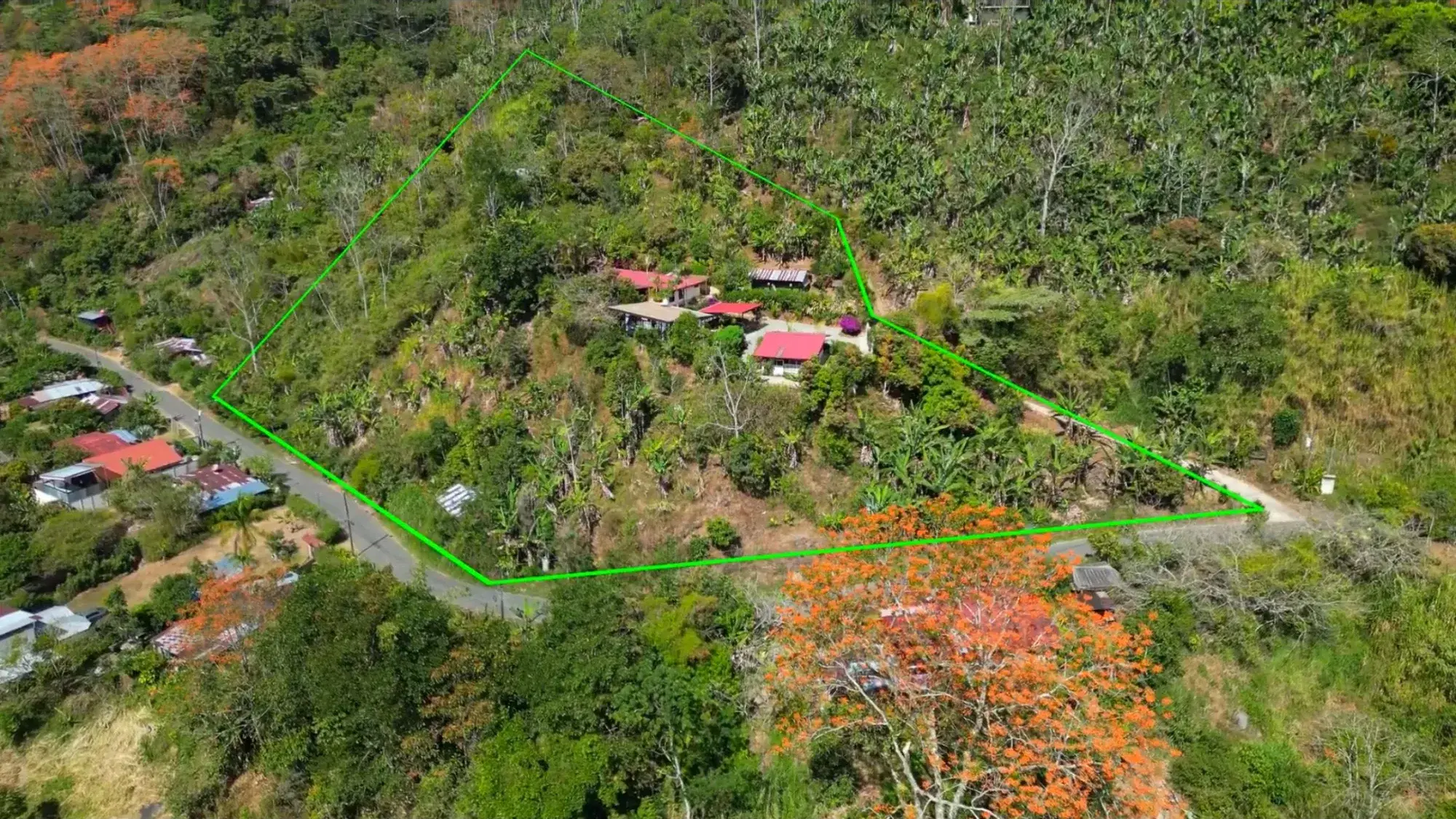 Overhead drone shot of the mountain estate property and valley in Southern Costa Rica
