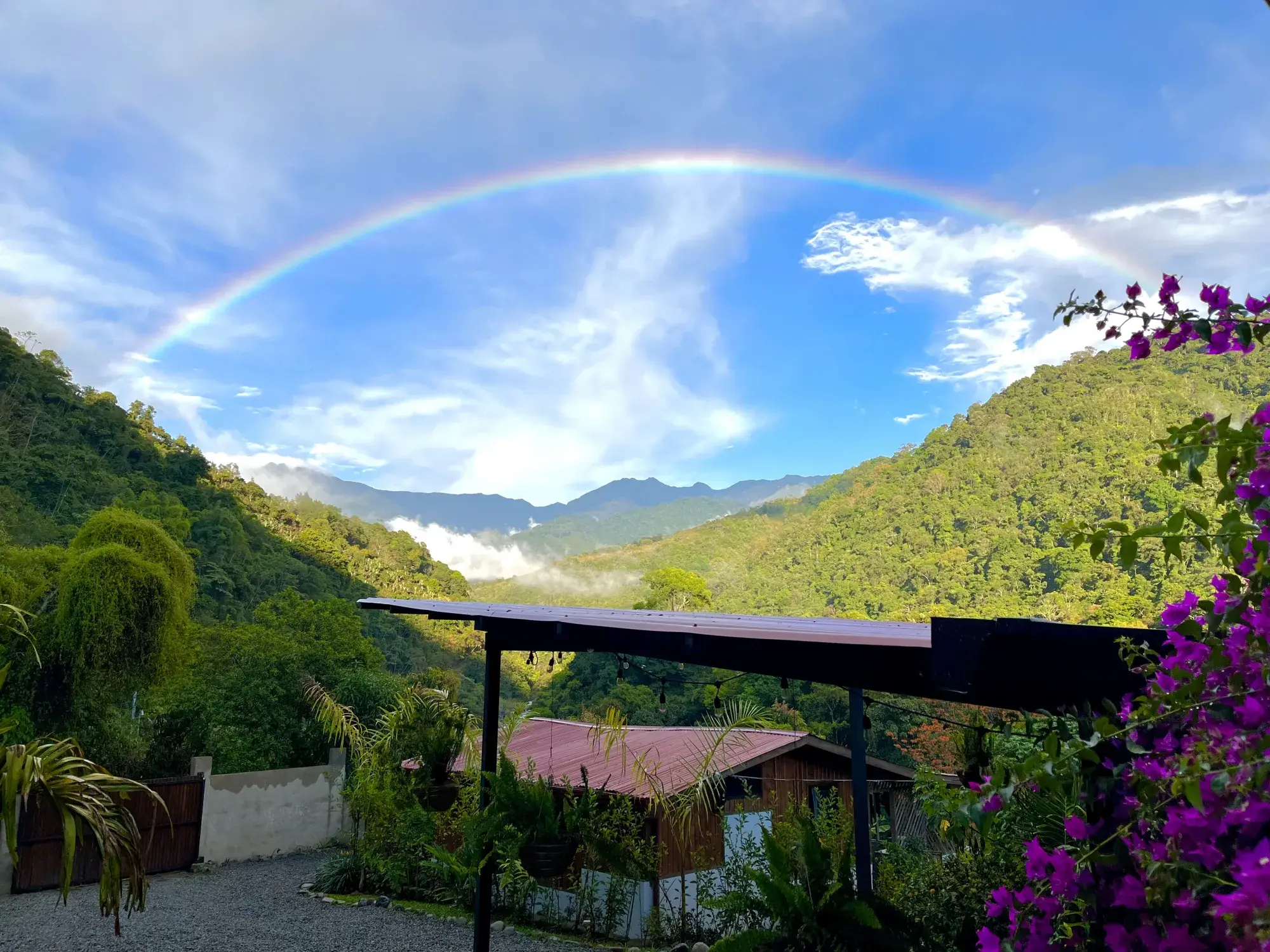 Rainbow over the Talamanca mountains seen from the estate in Pérez Zeledón, Costa Rica